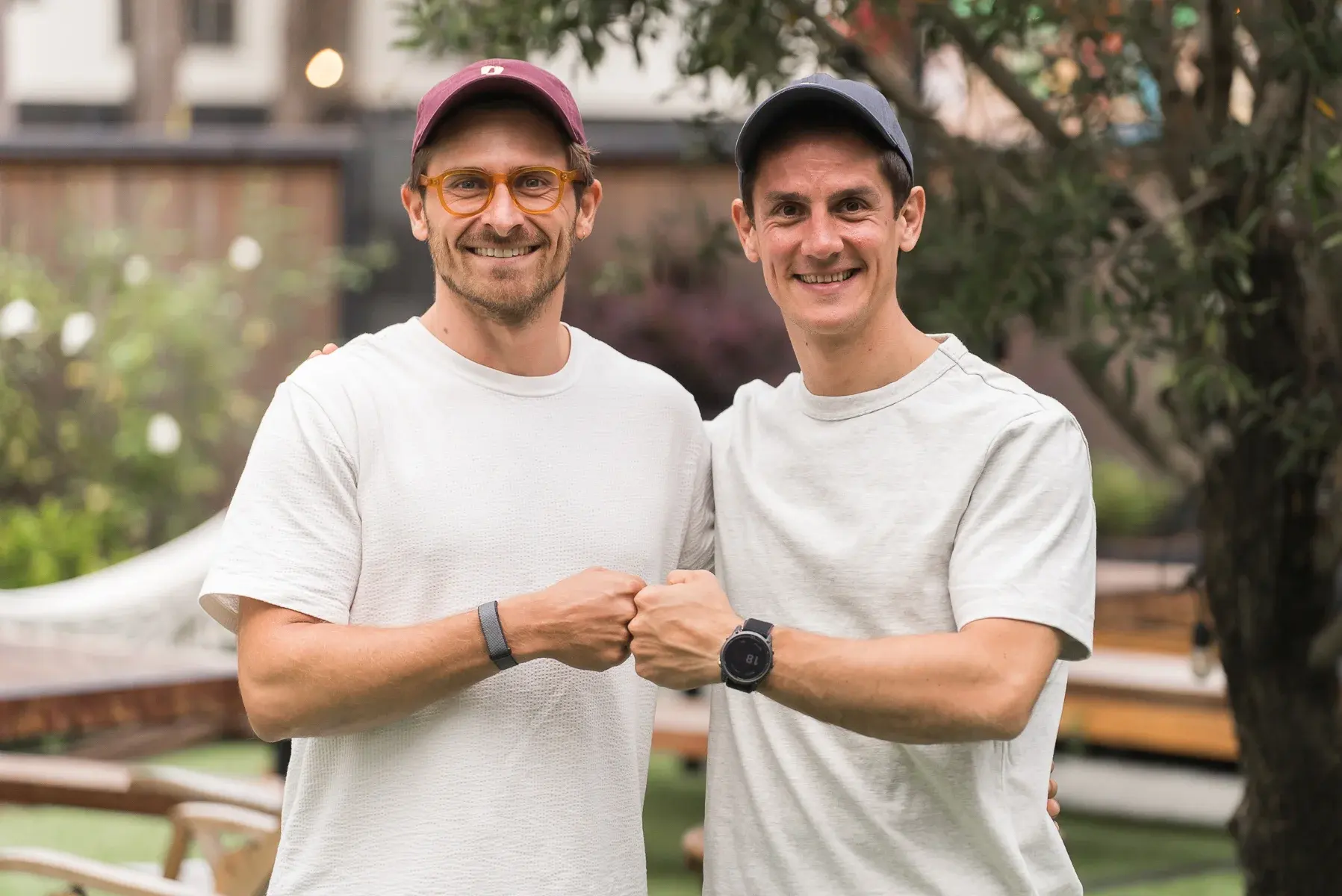 Adside founders Robin Choy and Guillaume Miara standing together outdoors