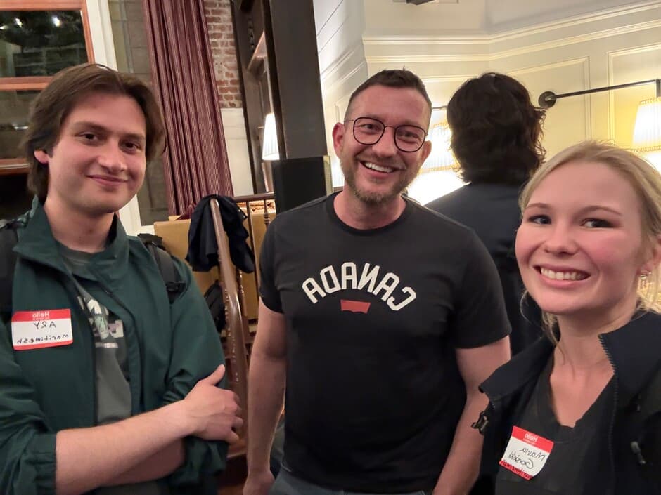 A photograph of the Maritime founders with a visitor at Y Combinator