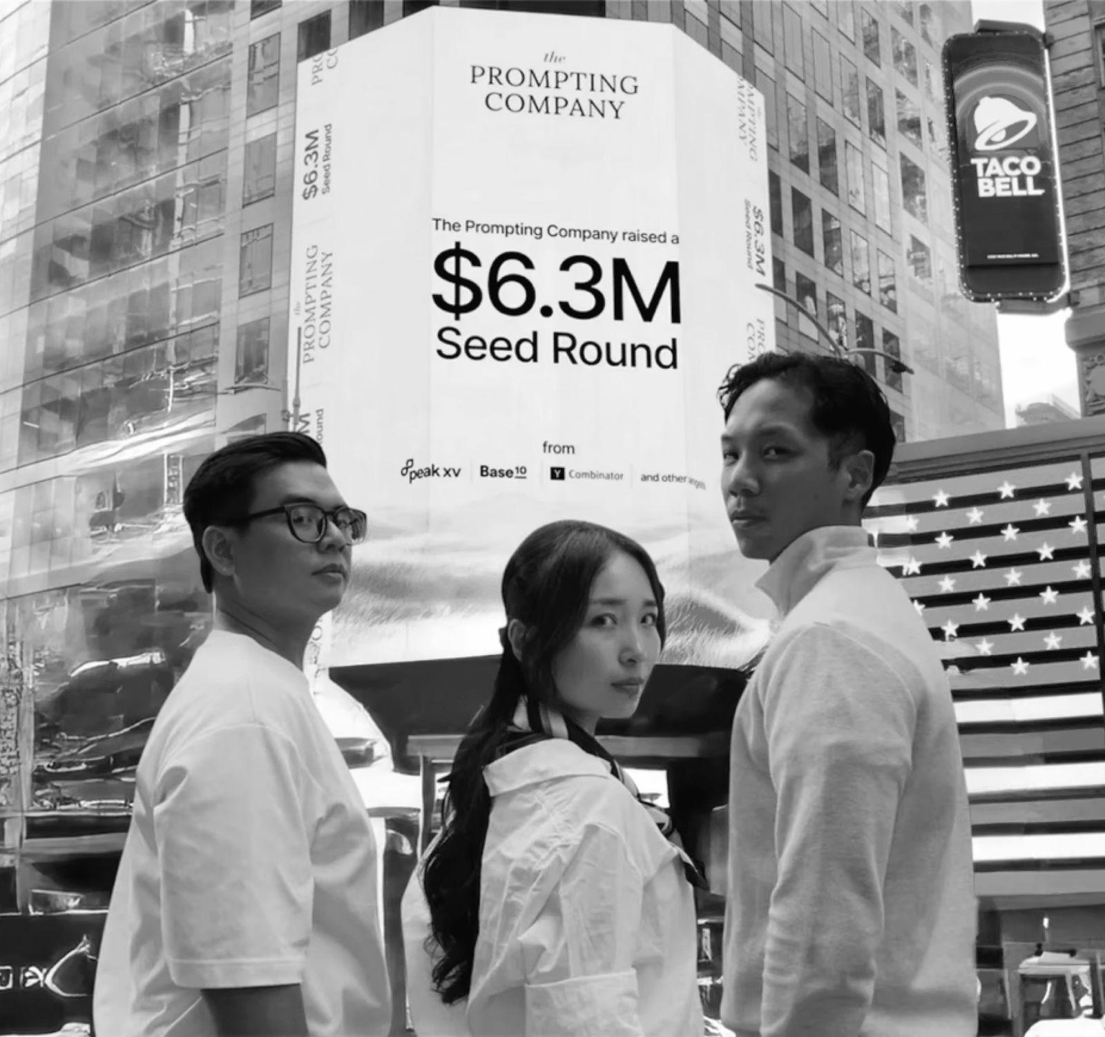 The Prompting Company founders beneath their Times Square fundraising billboard